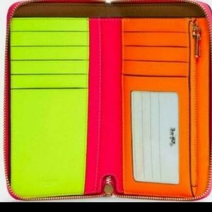 Looking for this Coach Wallet in Neon Pink